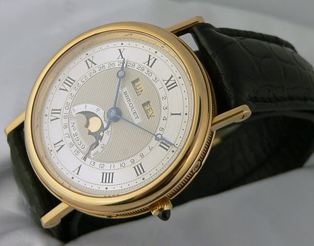 Breguet Serpentine Triple date moon YG
