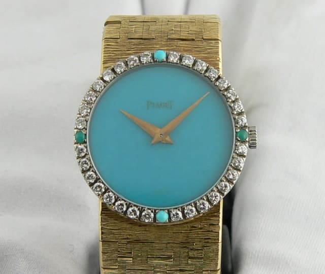 Piaget Ladies Turquoise Dial Diamond Bezel
YG/YG
