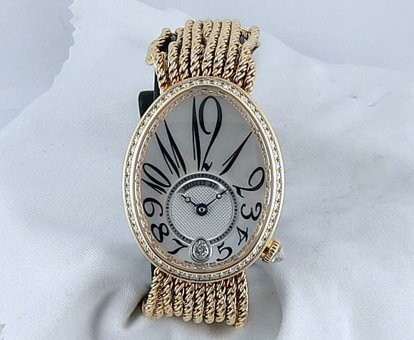 Breguet Reine De Naples
Yellow Gold