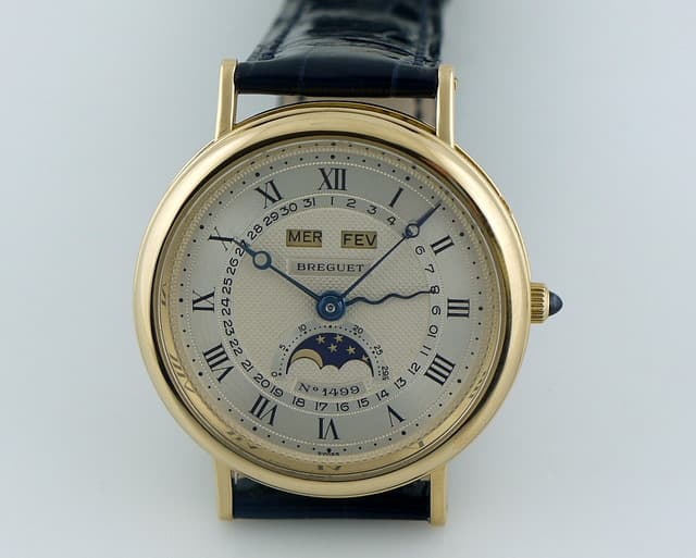 Breguet Serpentine Triple date moon YG
