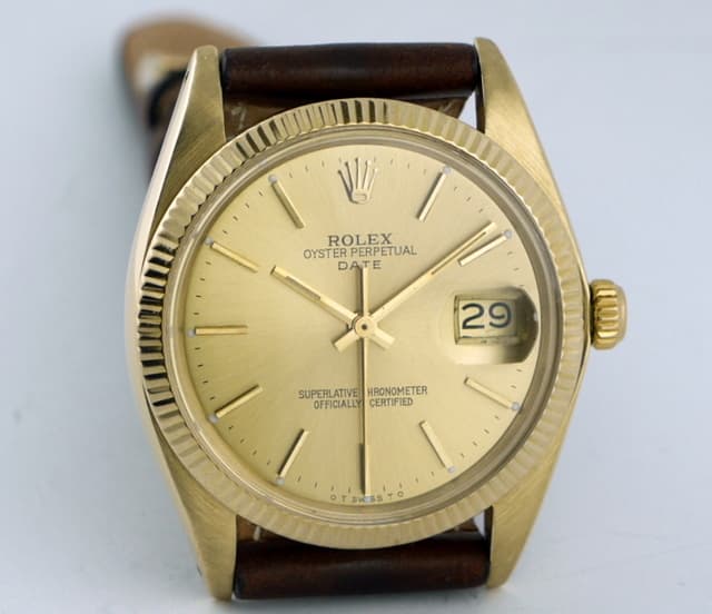 Rolex Oyster Perpetual Date YG