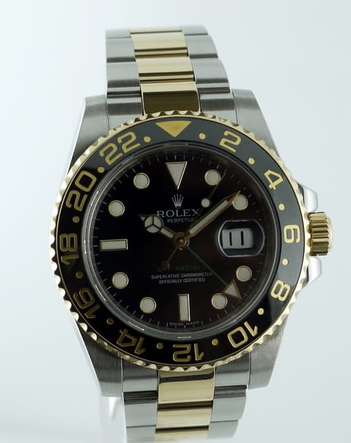 Rolex GMT Master II Gold/Steel
Black 
