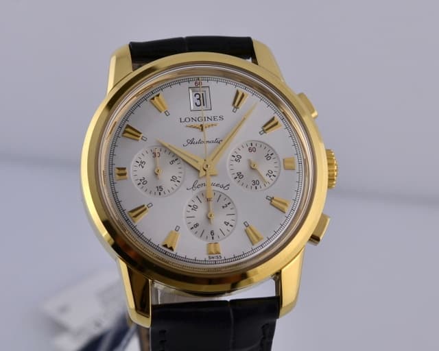 Longines Conquest Heritage Chronograph
18K Yellow Gold
Silver Dial 38.5MM