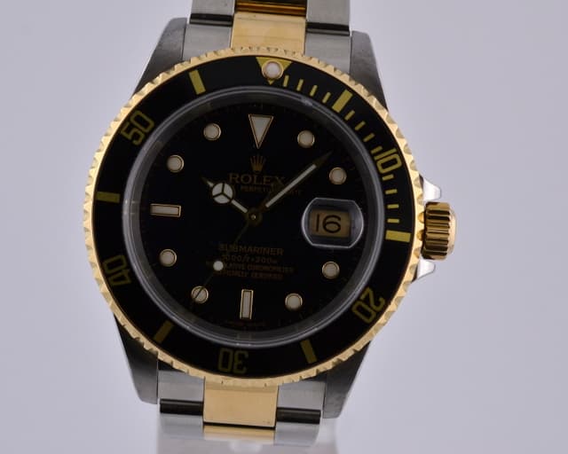 Rolex Submariner SS / 18K Yellow Gold Black Dial P Series (2001)