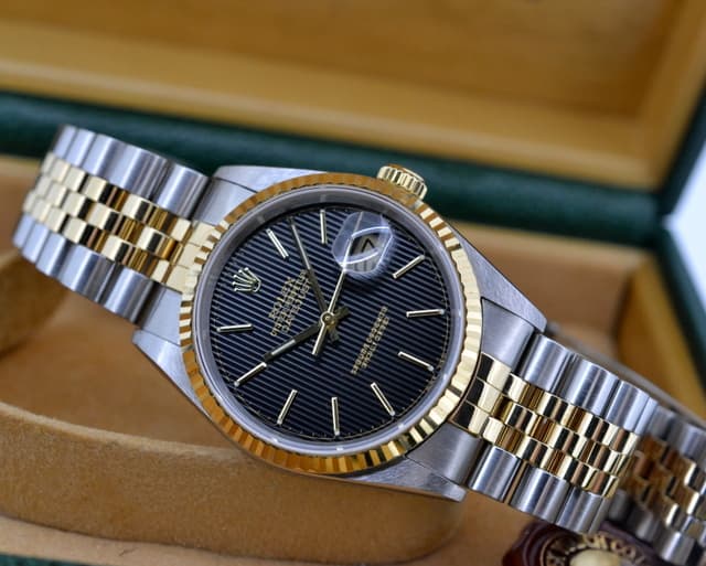 Rolex Datejust 18K / SS Black Tapestry Dial 