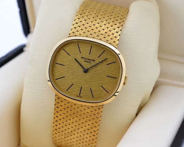 Patek Philippe Ellipse Champagne 18K  Yellow Gold / Mesh Bracelet