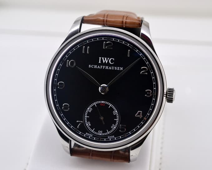 IWC Portuguese Hand Wound SS Black Dial UNWORN