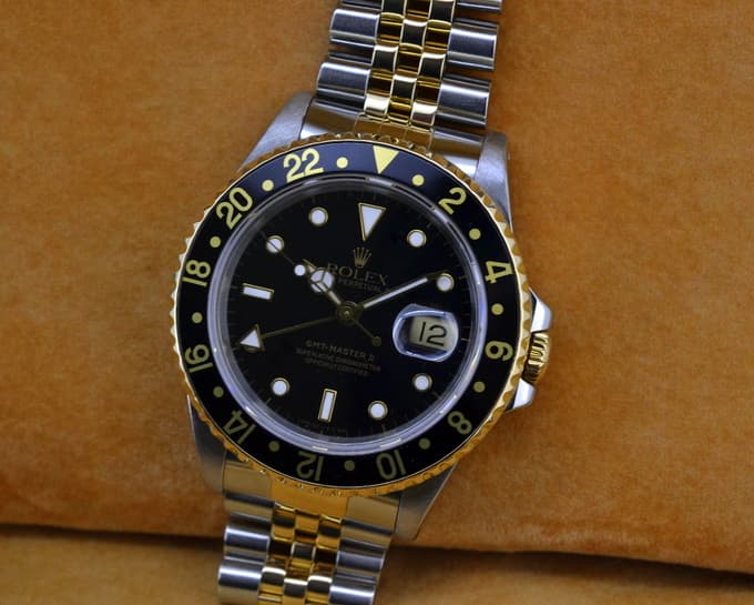 Rolex GMT Master II 18K / SS Black Dial
