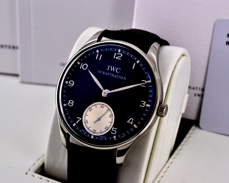 IWC Portuguese Hand Wound SS Black Dial UNWORN