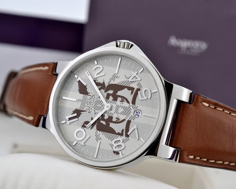 Asprey No. 8 Round Beige Coat of Arms Dial Quartz