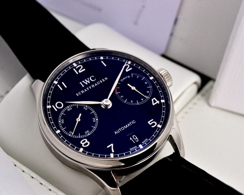 IWC Portuguese 7 Day SS / Black Dial UNWORN