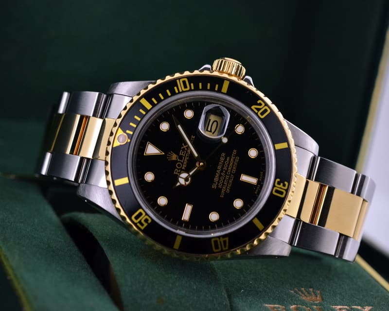 Rolex Submariner Black Dial 18K Yellow Gold / SS