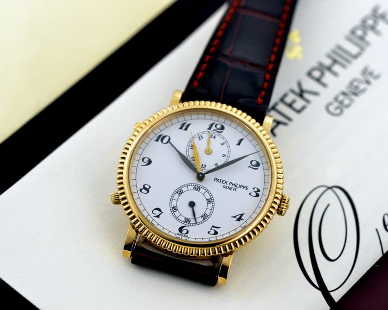 Patek Philippe Travel Time 18K Yellow Gold