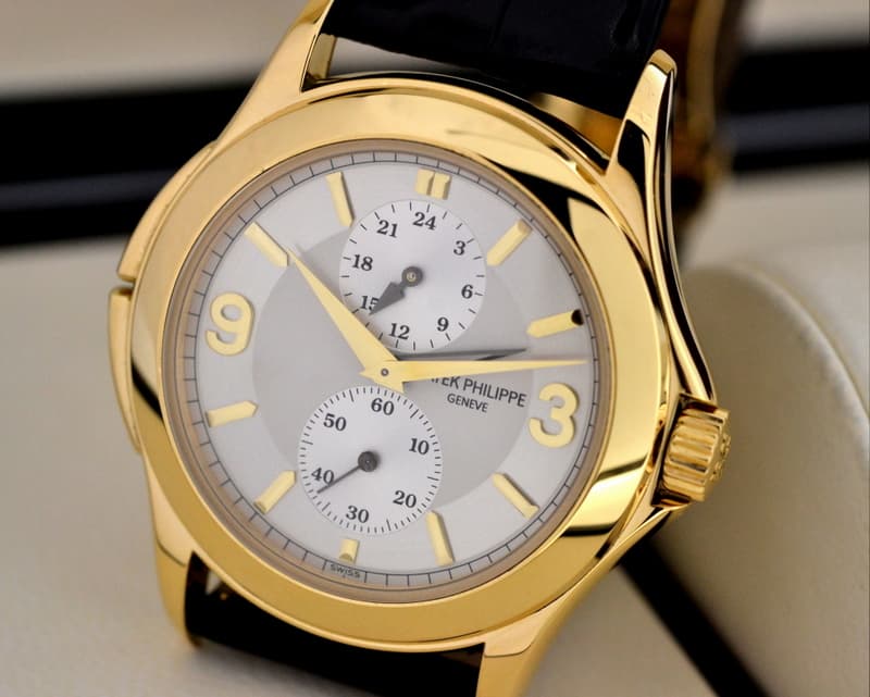 Patek Philippe Travel Time 18K Yellow Gold Manual Wind
