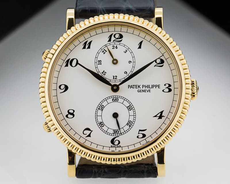 Patek Philippe Travel Time 18K Yellow Gold