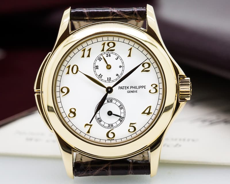 Patek Philippe Travel Time 18K Yellow Gold Manual Wind
