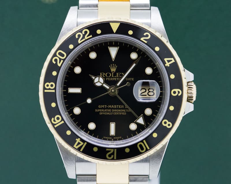 Rolex GMT Master II 18K / SS Black Dial
