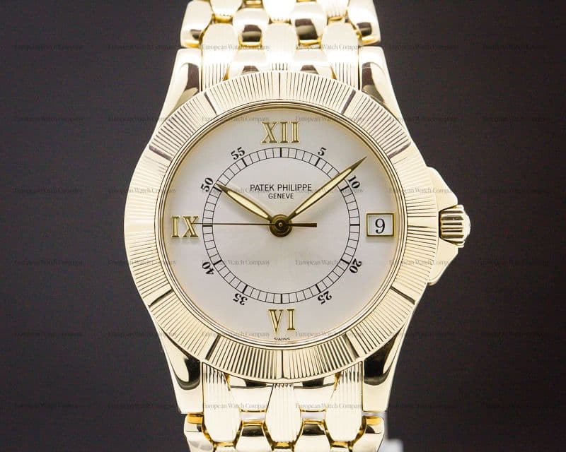 Patek Philippe Neptune Silver Dial 18K Yellow Gold