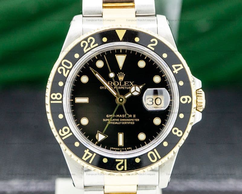 Rolex GMT Master II 18K / SS Black Dial
