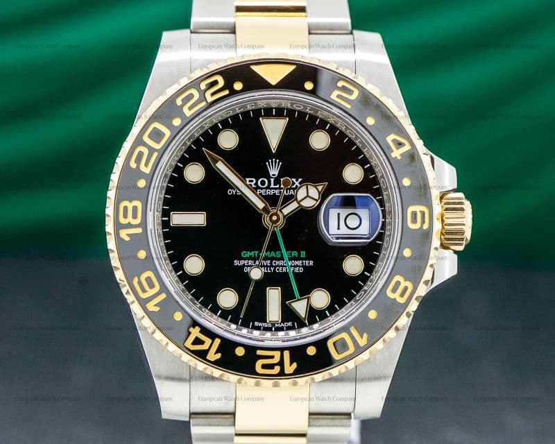 Rolex GMT Master II  SS / 18K Yellow Gold Black Dial 