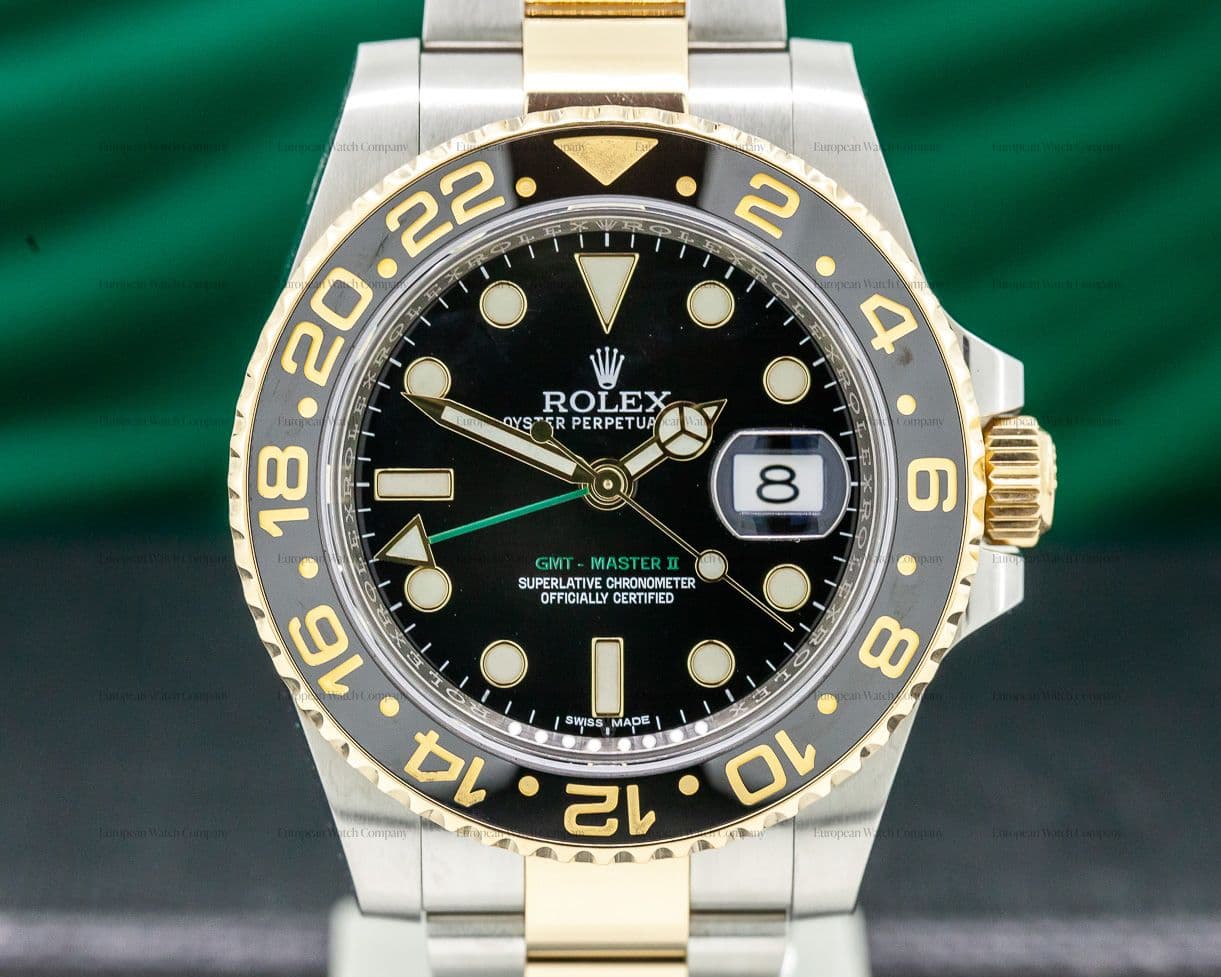 Rolex GMT Master II  SS / 18K Yellow Gold Black Dial DISCONTINUED