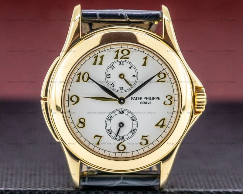 Patek Philippe Travel Time 18K Yellow Gold Manual Wind Deployant