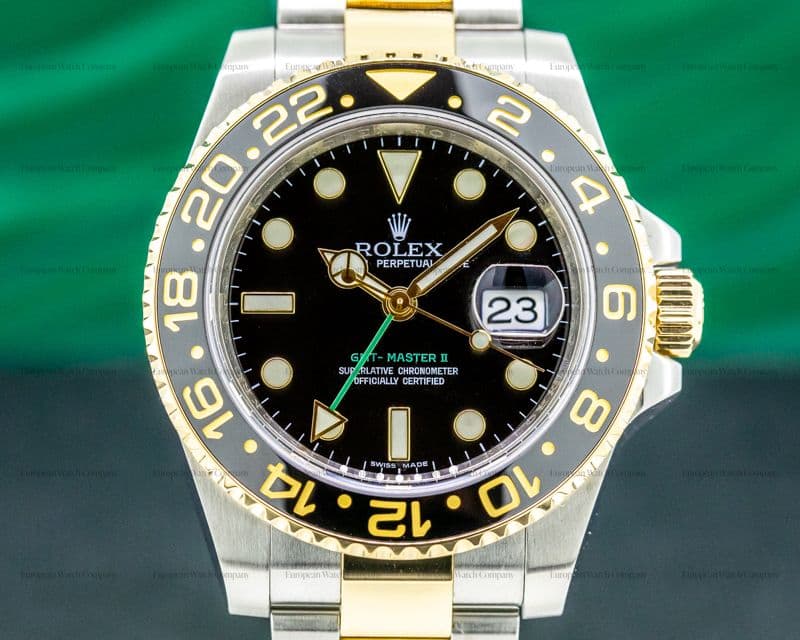 Rolex GMT Master II 116713LN  SS / 18K Yellow Gold Black Dial 