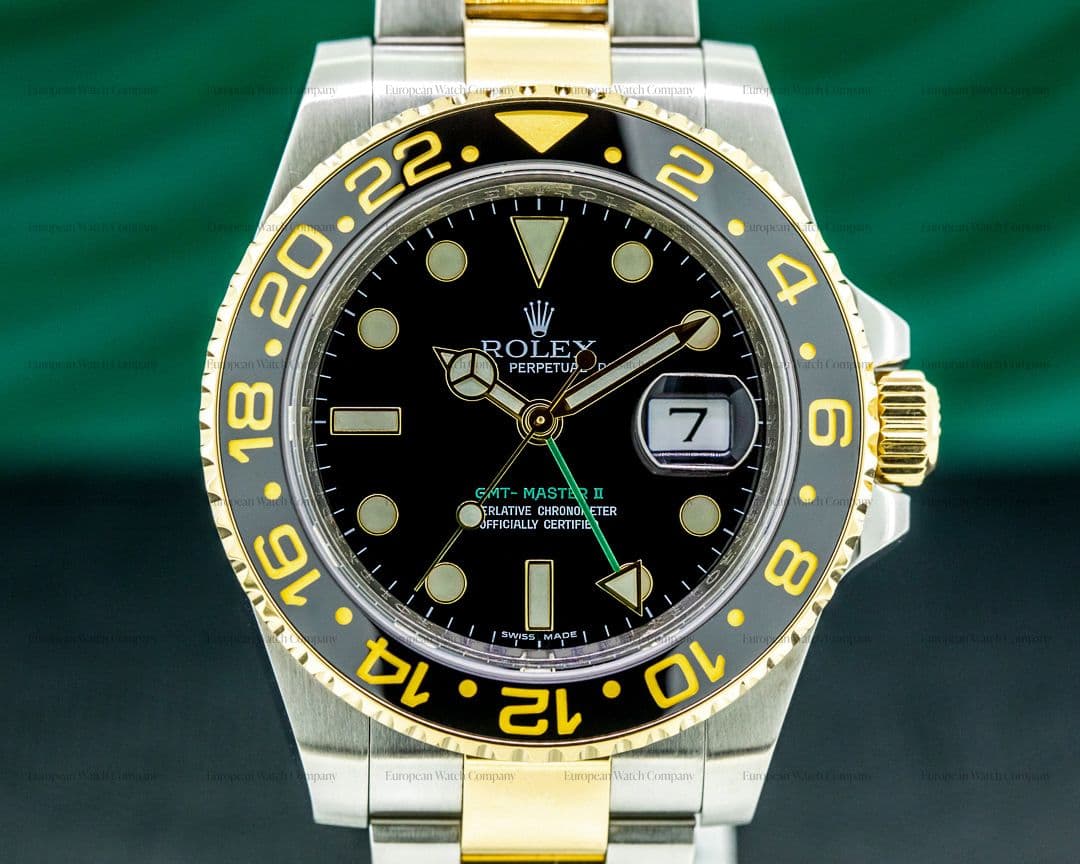 Rolex GMT Master II 116713LN  SS / 18K Yellow Gold Black Dial 