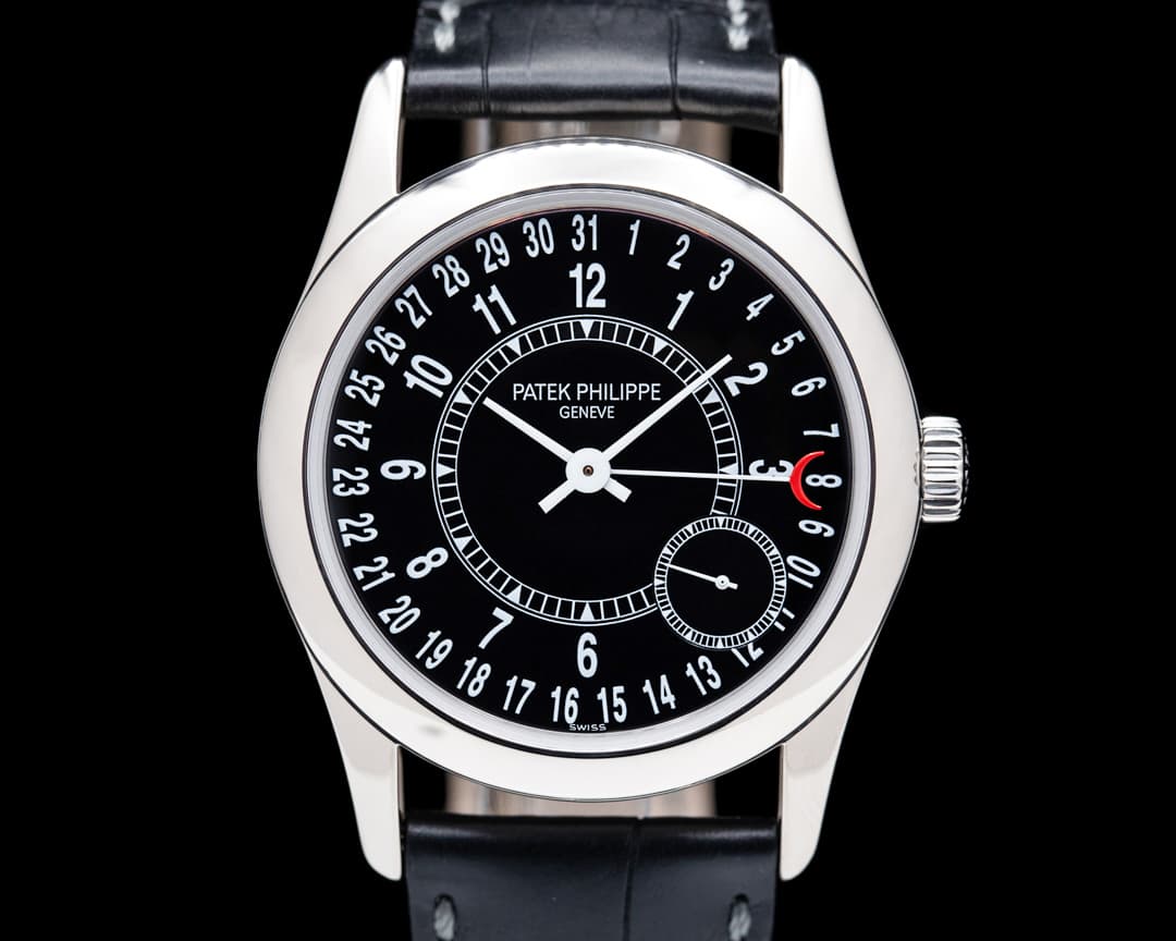 Patek Philippe Calatrava 6000G Black Dial 18K White Gold / Deployant