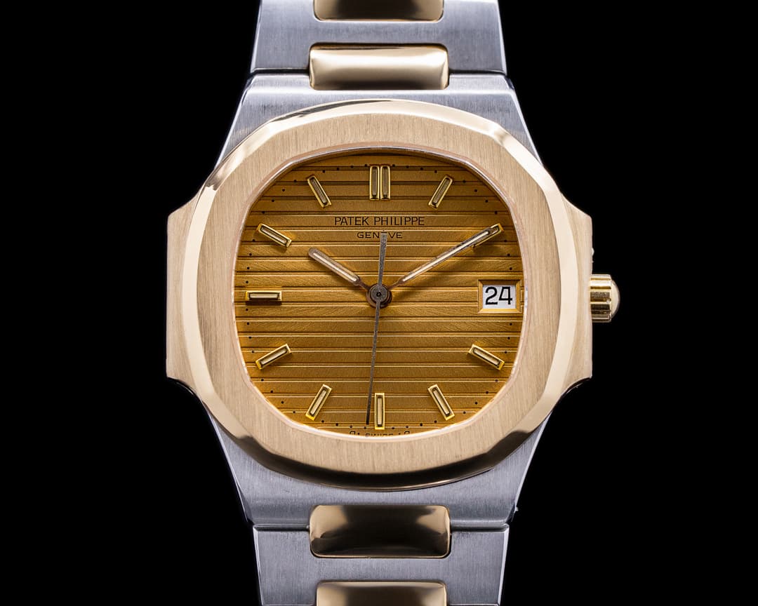 Patek Philippe Nautilus Mid Size 3900 Quartz Champagne Dial YG / SS 