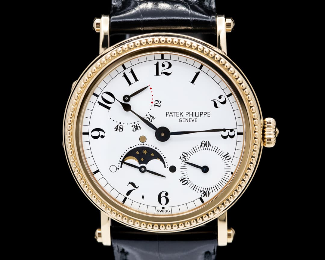 Patek Philippe Moonphase 5015J Power Reserve 18k Yellow Gold Hobnail Bezel 