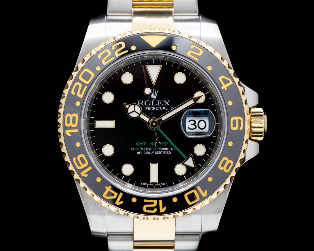 Rolex GMT Master II 116713LN  SS / 18K Yellow Gold Black Dial 