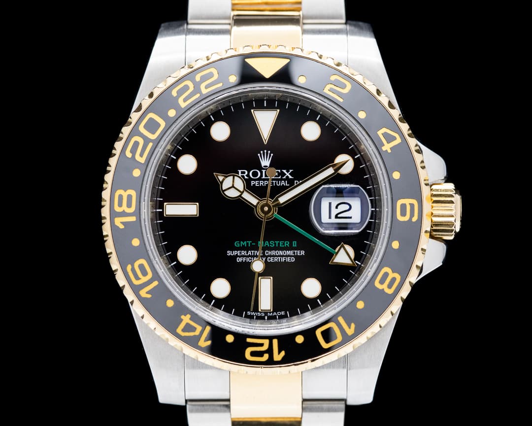 Rolex GMT Master II 116713LN  SS / 18K Yellow Gold Black Dial 
