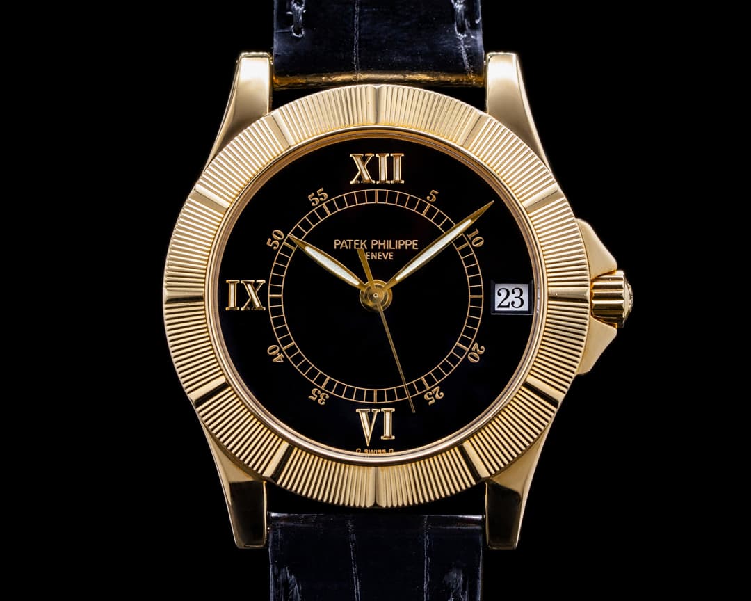 Patek Philippe Neptune Black Dial 18K Yellow Gold