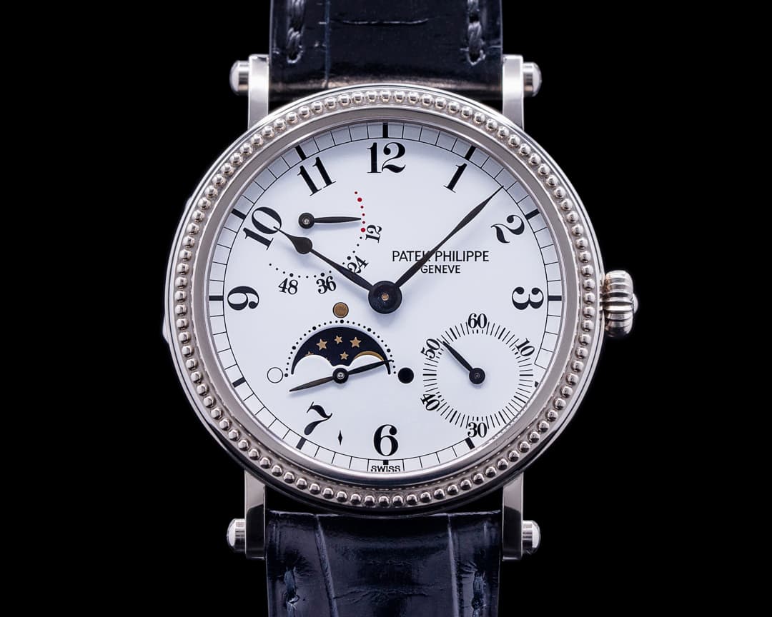 Patek Philippe Moonphase 5015G Power Reserve White Gold Hobnail Bezel