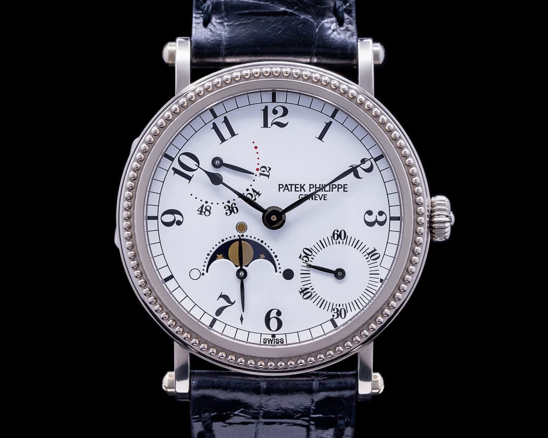 Patek Philippe Moonphase 5015G Power Reserve White Gold Hobnail Bezel