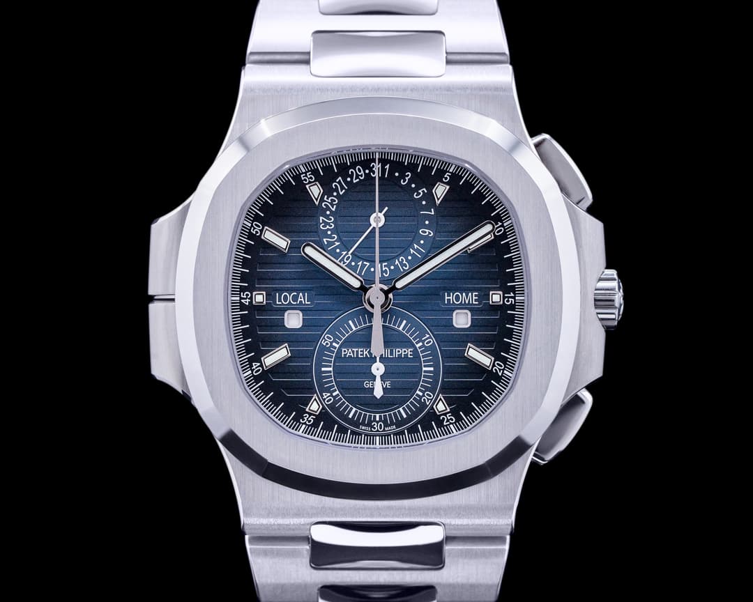 Patek Philippe Nautilus 5990 Travel Time Chronograph SS Blue Dial UNWORN