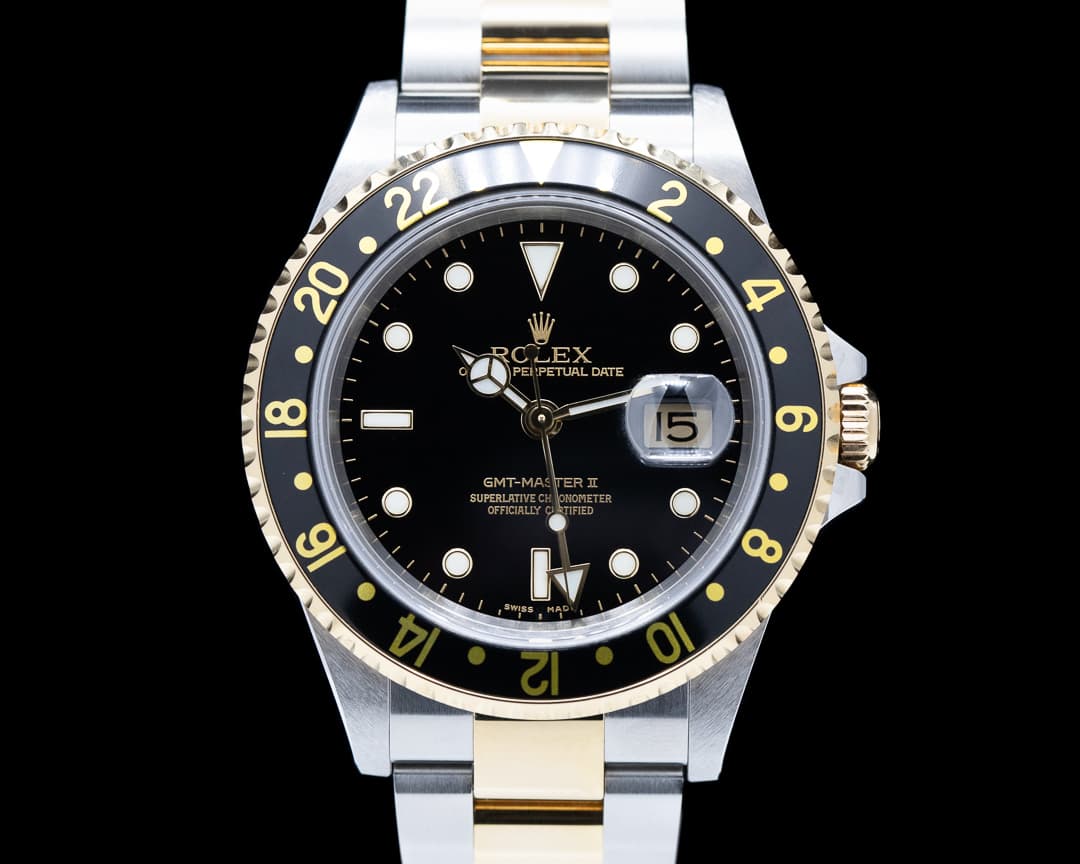 Rolex GMT Master II 18K / SS Black Dial "super sharp"
