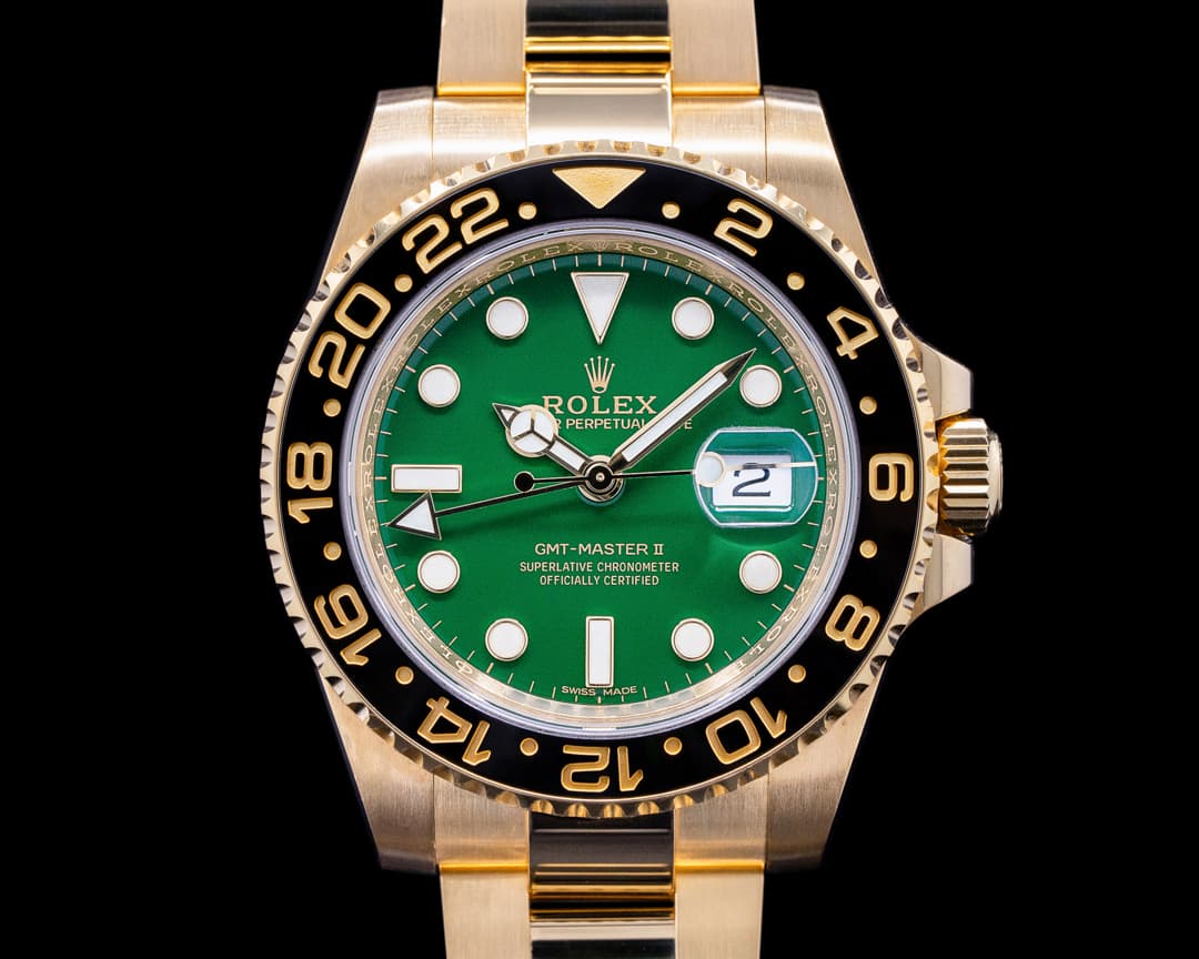 Rolex GMT Master II 116718 Green Dial 18K Yellow Gold / Bracelet