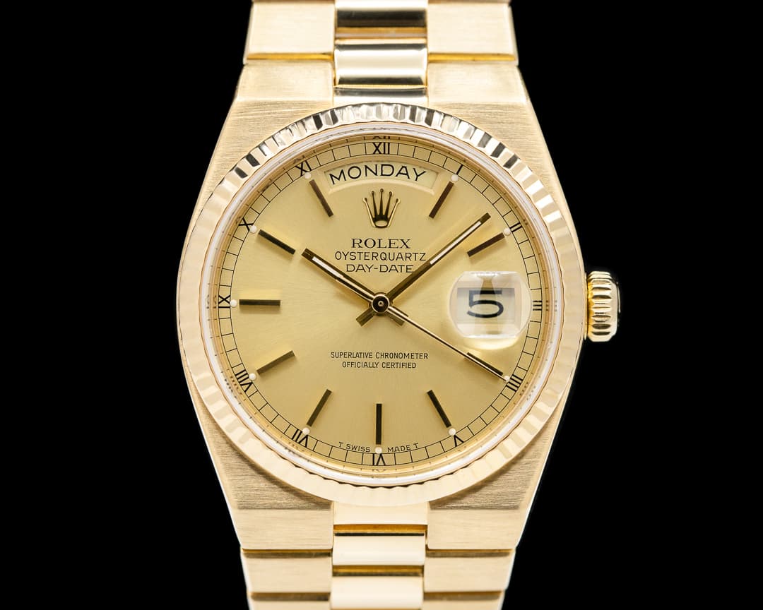 Rolex OysterQuartz Day Date 18K Yellow Gold / Champagne Dial 