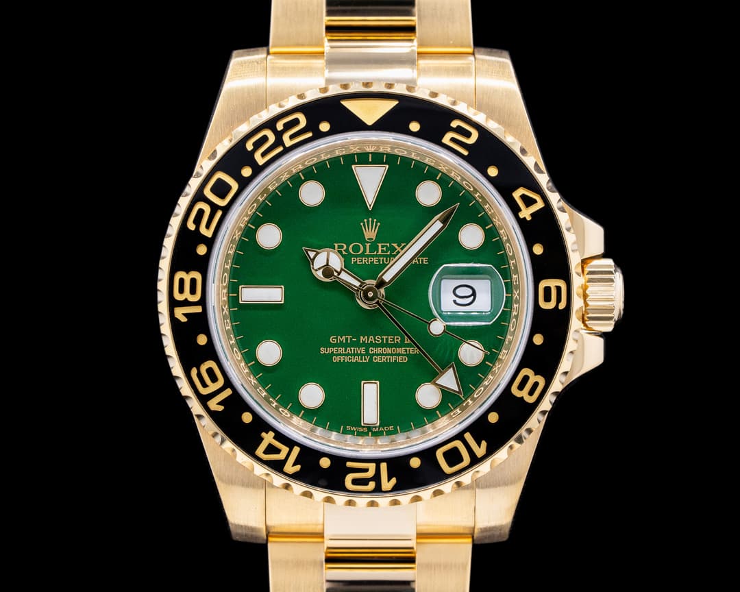 Rolex GMT Master II 116718 Green Dial 18K Yellow Gold / Bracelet