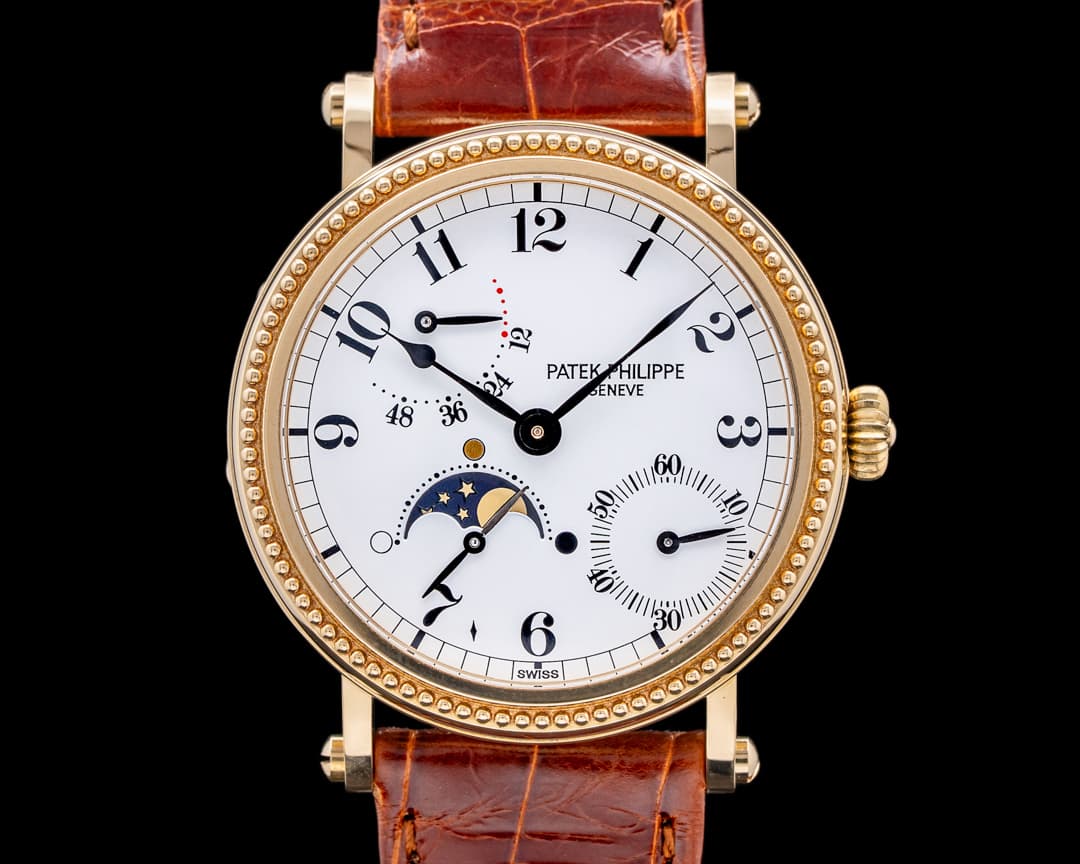 Patek Philippe Moonphase 5015J Power Reserve 18k Yellow Gold Hobnail Bezel 