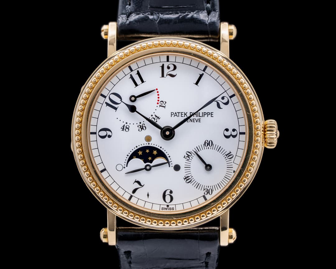 Patek Philippe Moonphase 5015J Power Reserve 18k Yellow Gold Hobnail Bezel 