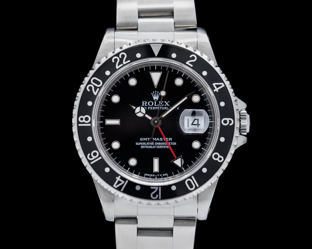 Rolex 16700 GMT Master Black Bezel 16700 Box and Papers