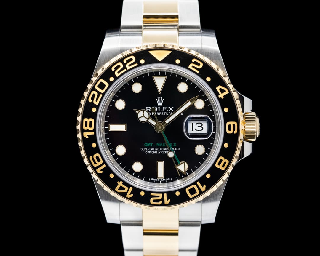 Rolex GMT Master II 116713LN  SS / 18K Yellow Gold Black Dial