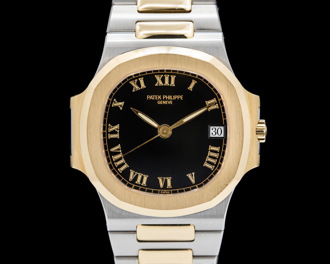Patek Philippe Nautilus 3800 Automatic SS / YG Black Roman Dial RARE