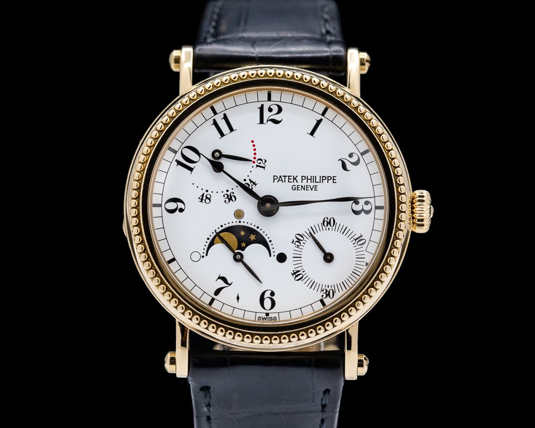 Patek Philippe Moonphase 5015J Power Reserve 18k Yellow Gold Hobnail Bezel 