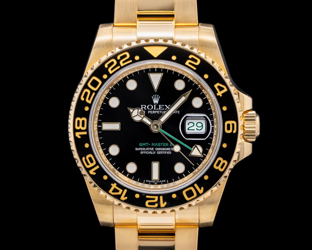 Rolex GMT Master II 116718 Black Dial 18K Yellow Gold 