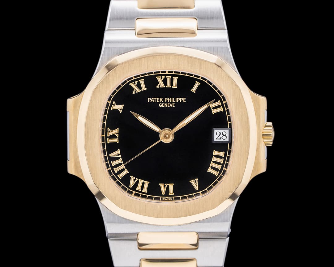 Patek Philippe Nautilus 3800 Automatic SS / YG Black Roman Dial RARE