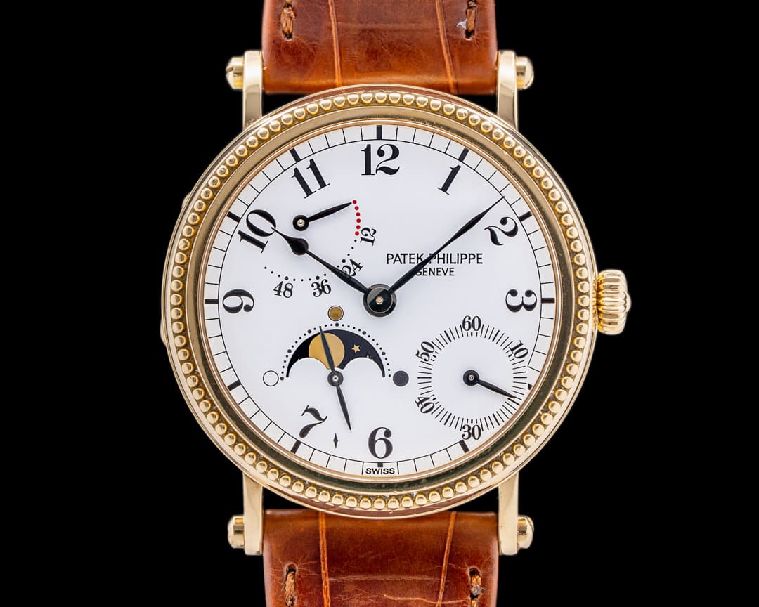Patek Philippe Moonphase 5015J Power Reserve 18k Yellow Gold Hobnail Bezel